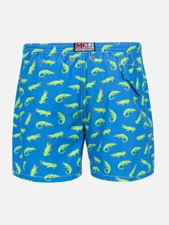 Costume da bambino bluette con stampa alligatore verde