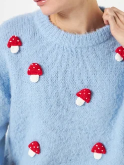 Maglia da donna girocollo garzata con applicazione di funghi