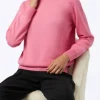 Maglione da donna dolcevita rosa lavorato a maglia