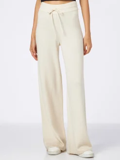 Pantaloni a palazzo in maglia bianca