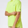 Polo da uomo in piquet giallo fluo con logo St. Barth ed effetto vintage