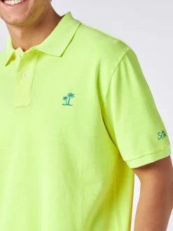 Polo da uomo in piquet giallo fluo con logo St. Barth ed effetto vintage