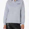 Polo grigia da donna Berenice con St Barth sport club